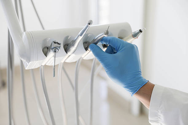 Professional Root Canal Treatment technician working in Eastport, NY